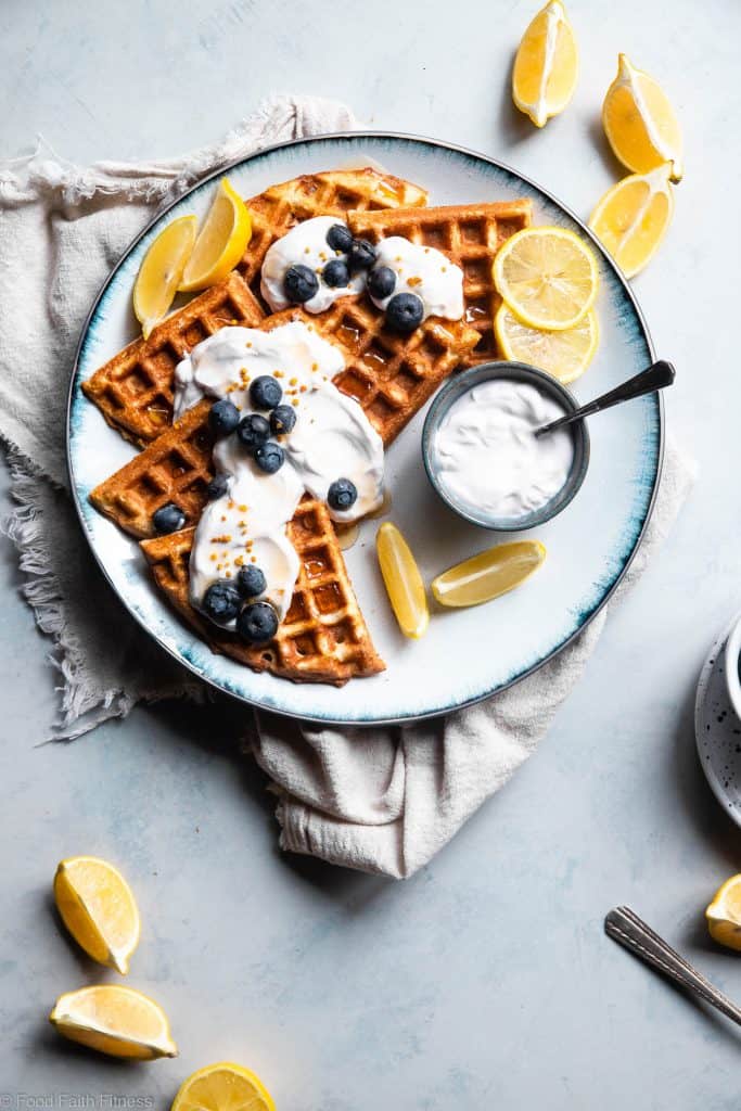 Lemon Blueberry Gluten Free Greek Yogurt Waffles - These gluten free waffles are so crispy and fluffy you will never believe they're low fat, oil free, protein packed and only 170 calories! | #Foodfaithfitness | #Glutenfree #Lowfat #Healthy #Waffles #Breakfast