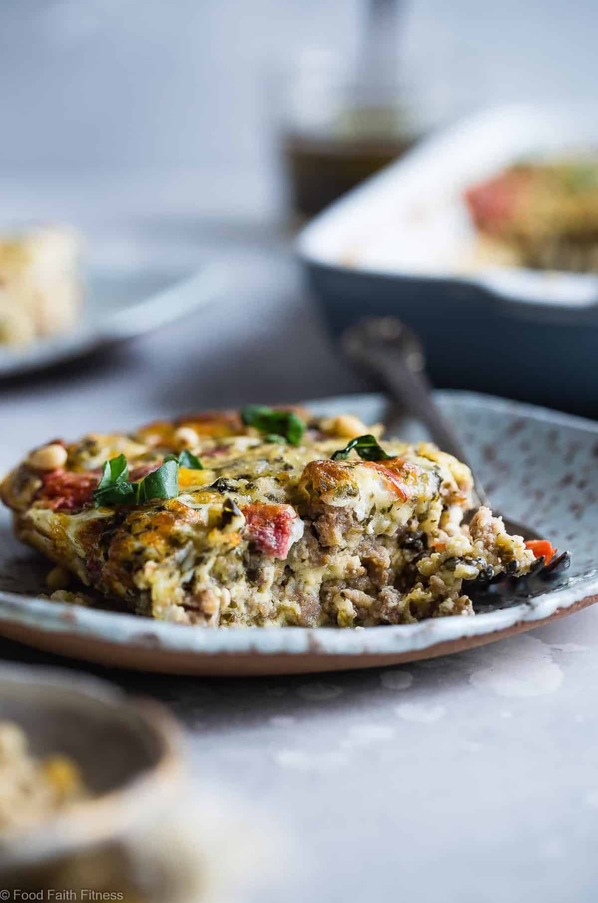 a slice of keto breakfast casserole on a plate with frok