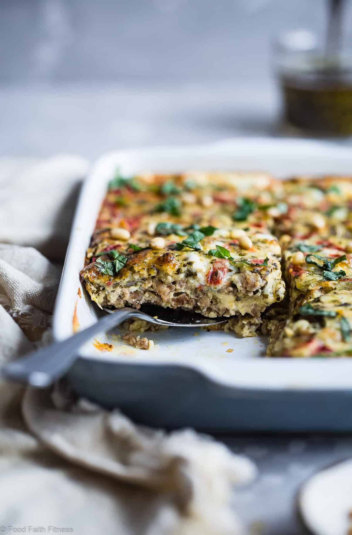 Keto Breakfast Casserole in a dish with a serving spoon