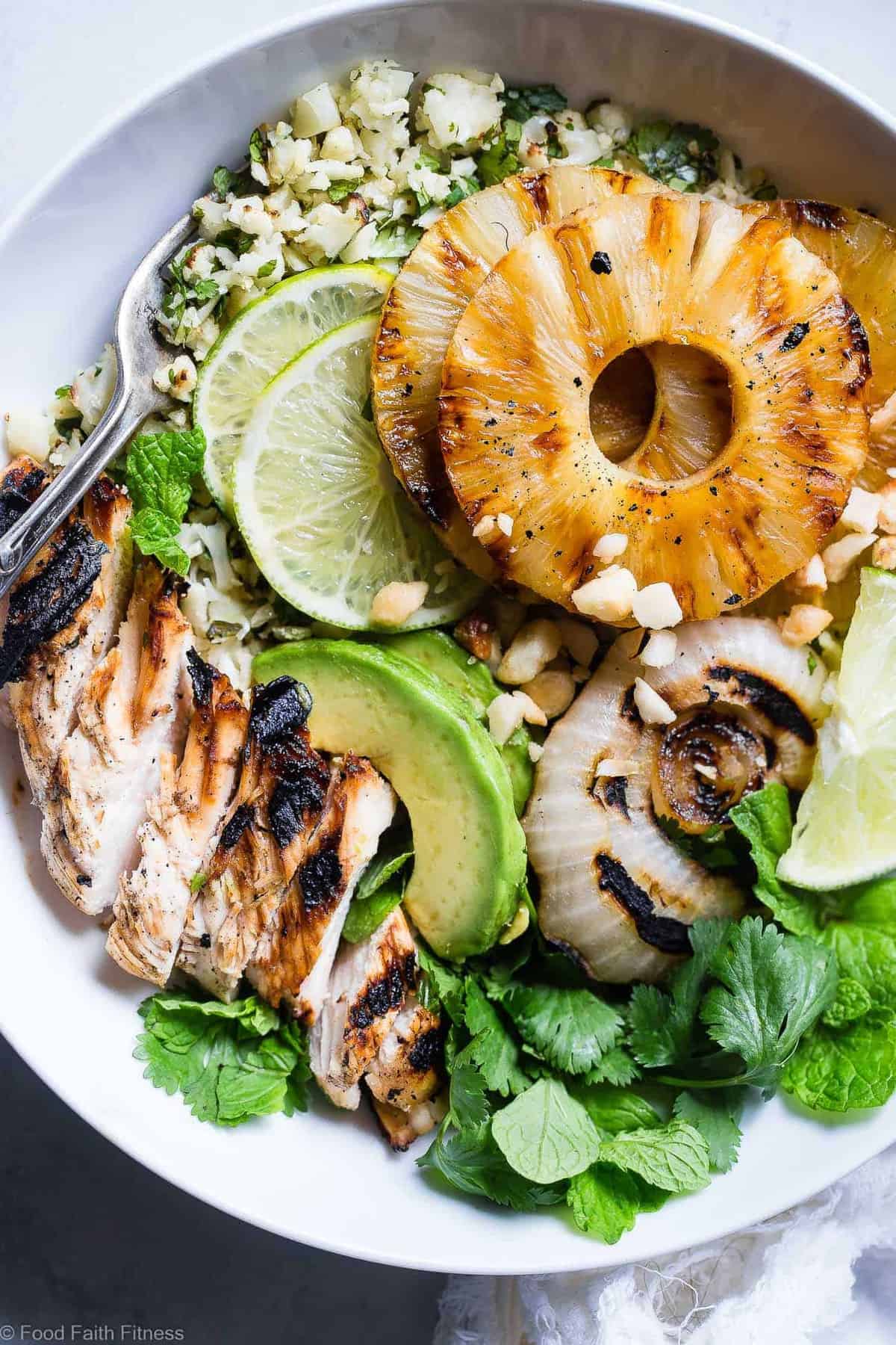  Grilled Tropical Chicken Bowls - These paleo and whole30 compliant Grilled Tropical Chicken bowls are an easy, healthy and gluten free weeknight dinner loaded with sweet and tangy island flavors! Sure to be a crowd pleaser! | #Foodfaithfitness | #Paleo #Whole30 #Glutenfree #Healthy #Chickendinner