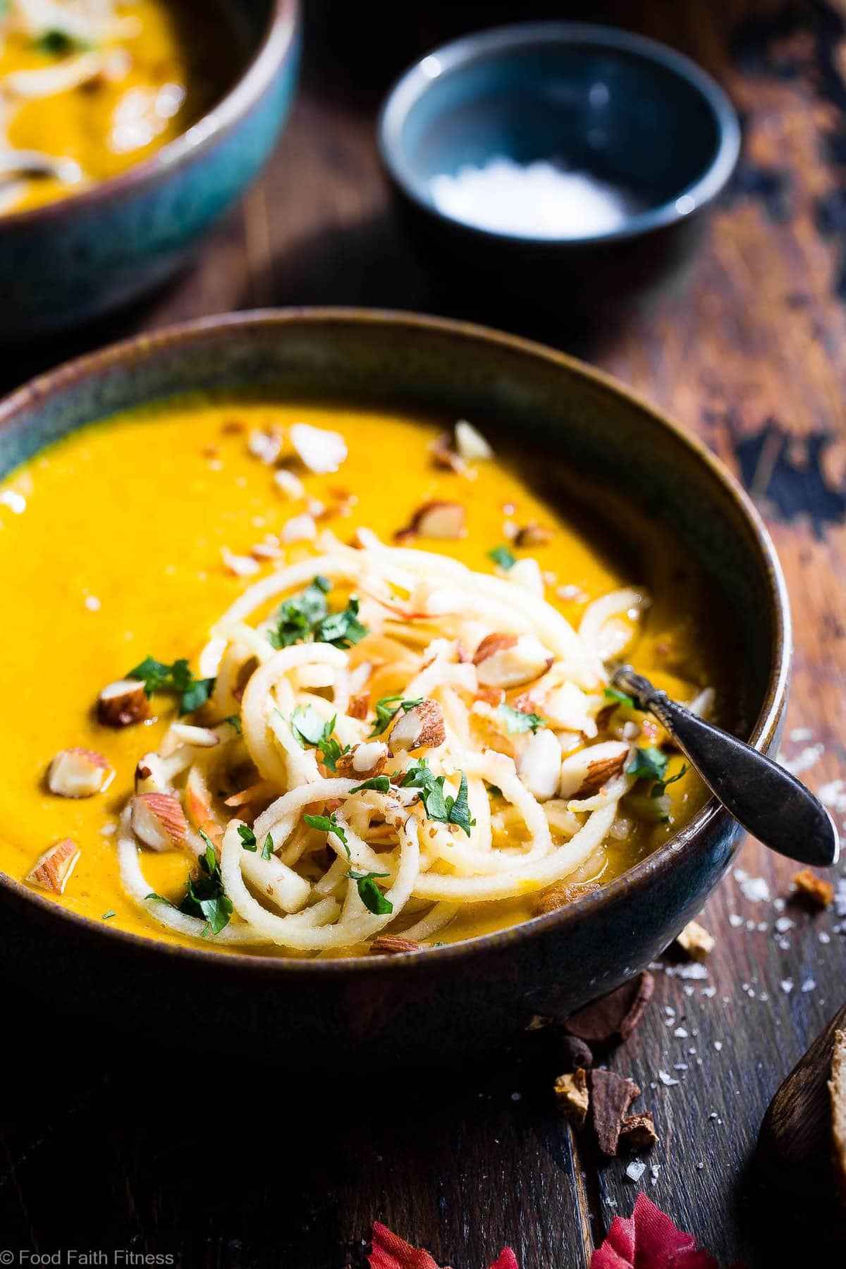 Slow Cooker Creamy Fall Vegan Sweet Potato Soup - this easy sweet potato soup is made in the slow cooker for an EASY weeknight dinner that is loaded with spicy-sweet, cozy flavor! Gluten free, paleo and SO creamy and delicious! | #Foodfaithfitness | #Paleo #Glutenfree #Vegan #Dairyfree #slowcooker