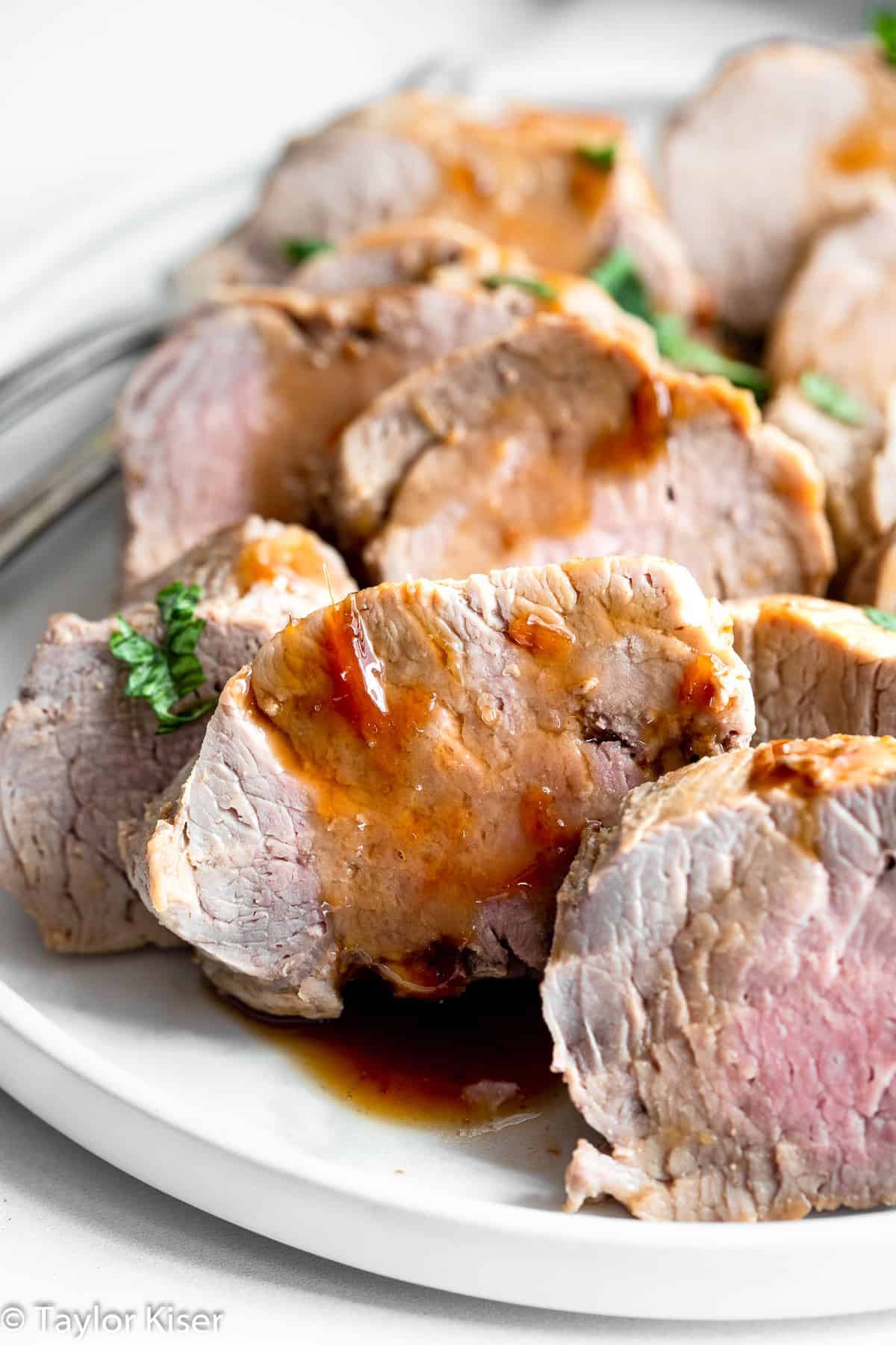 Instant Pot Pork Tenderloin on a plate with sauce 