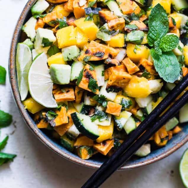 Thai Mango Avocado Salad with Grilled Sweet Potatoes - Loaded with sweet mango, tangy lime juice and creamy avocado, this is an EASY, healthy summer side that is sure to please! Gluten free, vegan, paleo and whole30 friendly too! | #Foodfaithfitness | #Whole30 #Glutenfree #Vegan #Paleo #Dairyfree