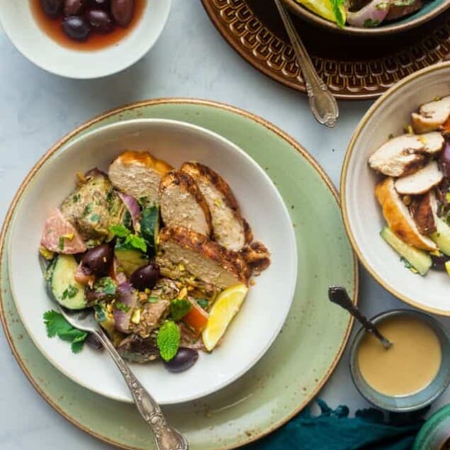 Paleo Grilled Moroccan Chicken Bowls - These grilled Moroccan chicken bowls are loaded with charred veggies, creamy tahini and spicy chicken! They're a quick and easy dinner that's paleo friendly and Whole30 compliant! | Foodfaithfitness.com | @FoodFaithFit